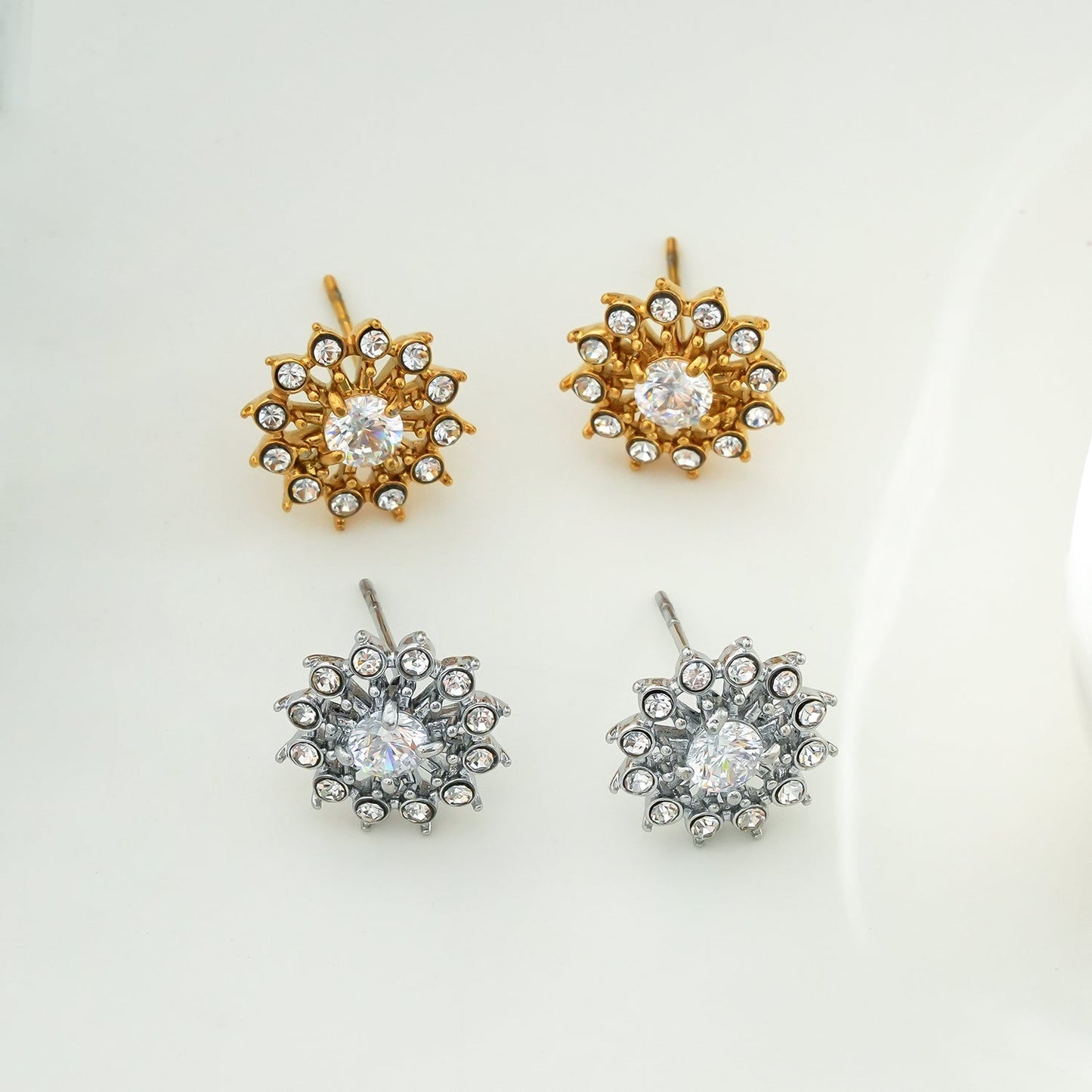 KERELA White Gold (Silver Toned): Shimmering Star Zirconia Stud Earrings
