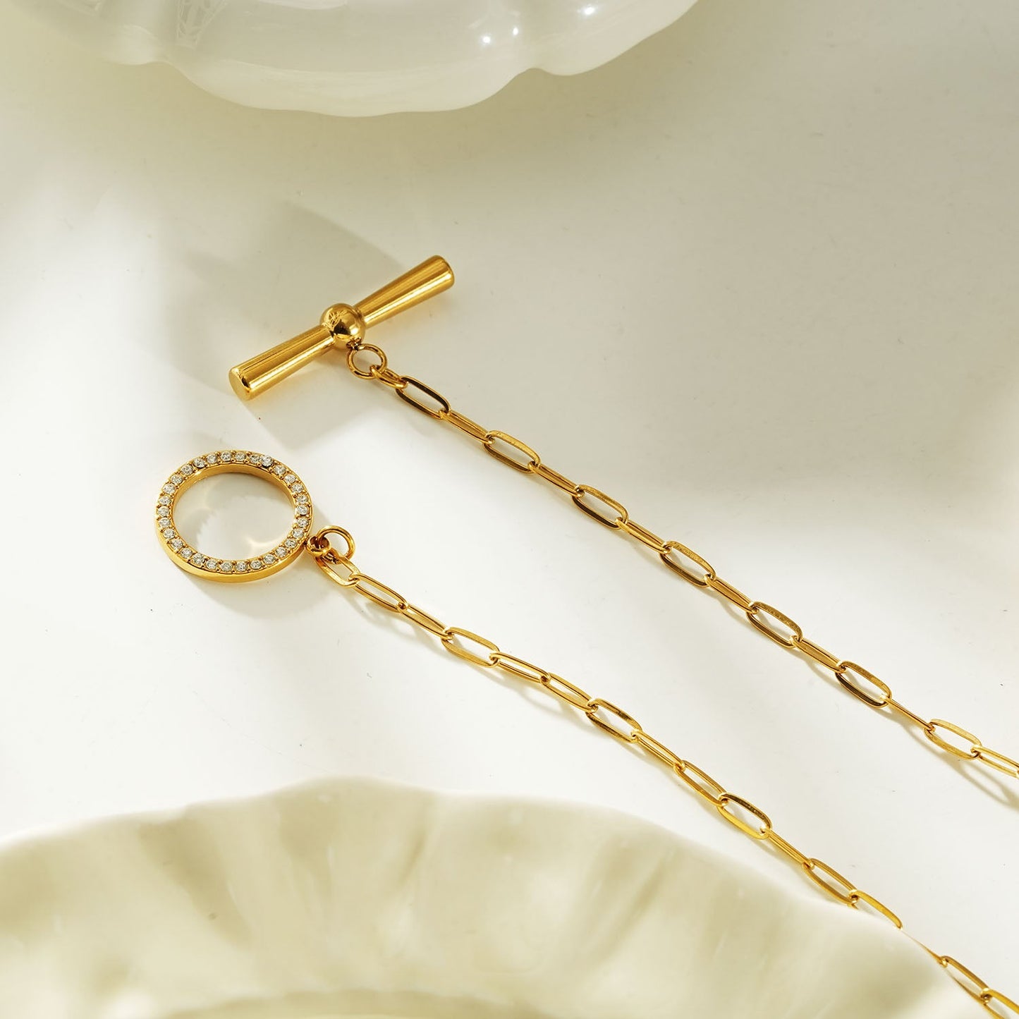 SADIKA Gold: Modern Pavé Zirconia Halo Toggle Necklace