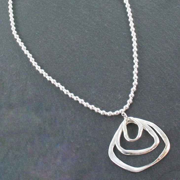 Silver Ball Necklace With Triple Ring Pendant In Silver Plate