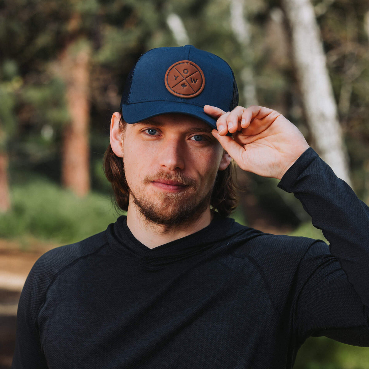 YOW Compass Leather Patch Trucker Hat