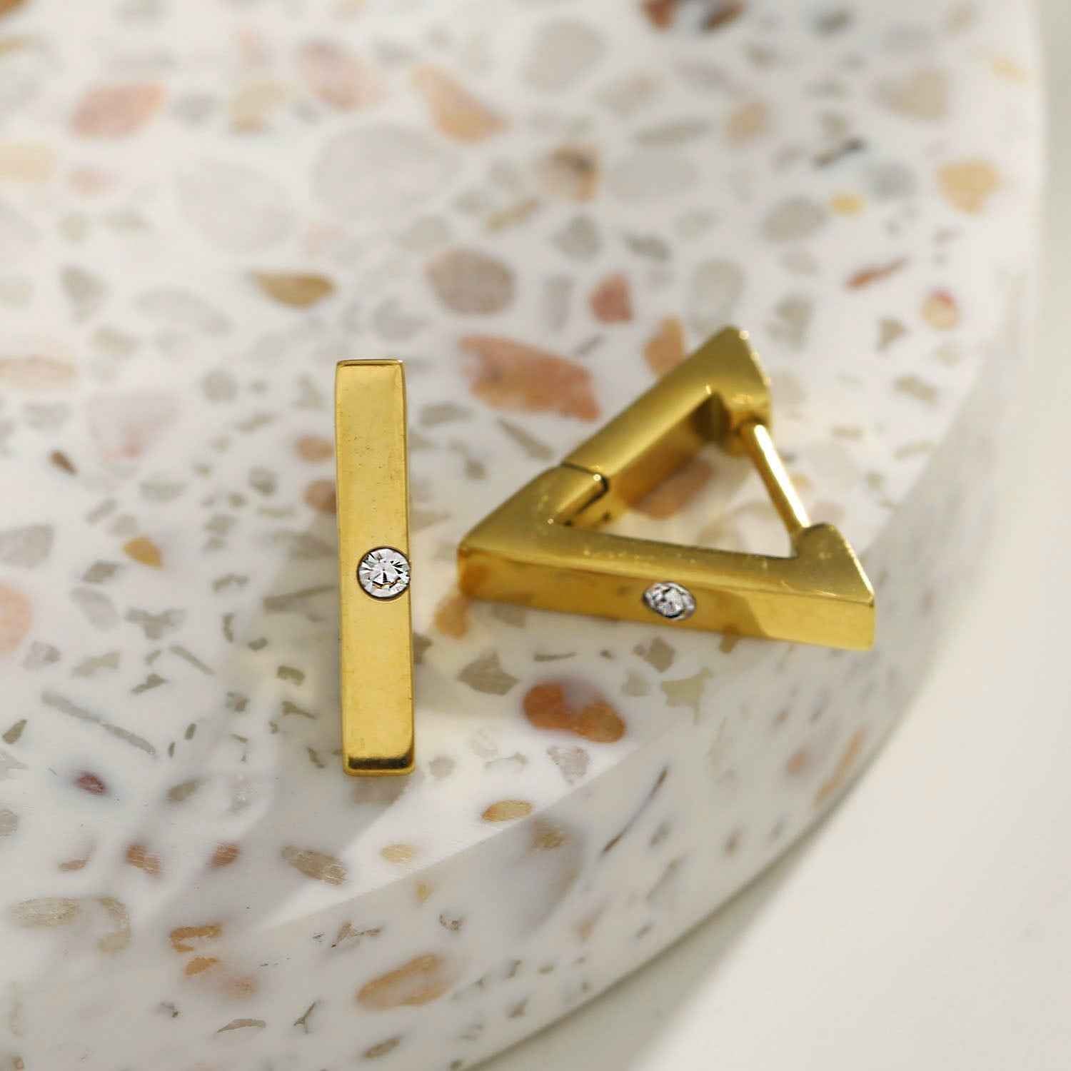 AMIRA: Triangle Shaped Mini Hoop Earrings with Solitaire Zirconia.