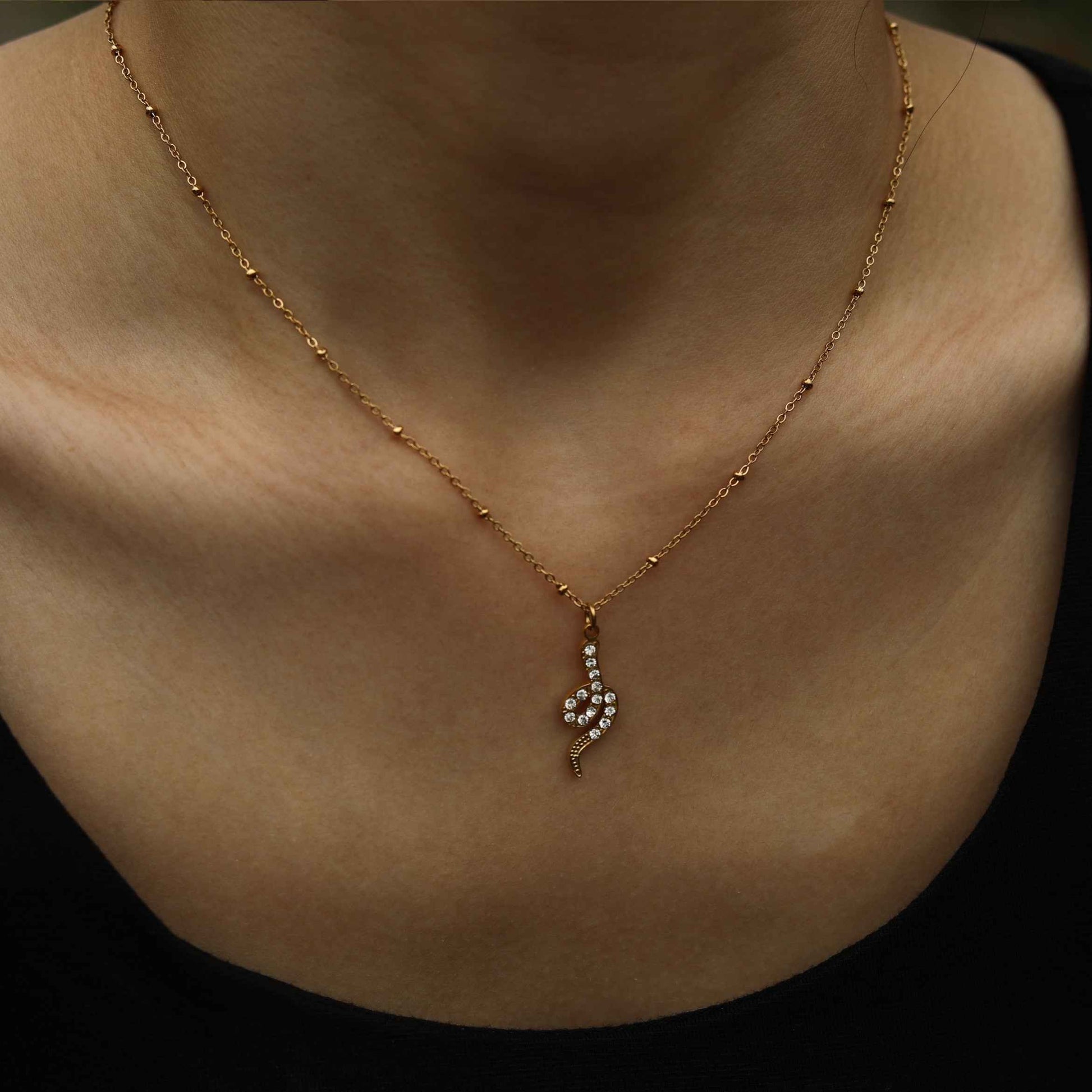 RIHANNA Beaded Chain Necklace with a Pavé Zirconia Serpent Pendant in Gold