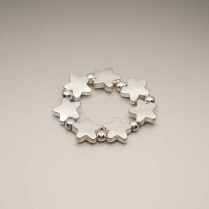 Elasticated Star Ring In Silver Plate