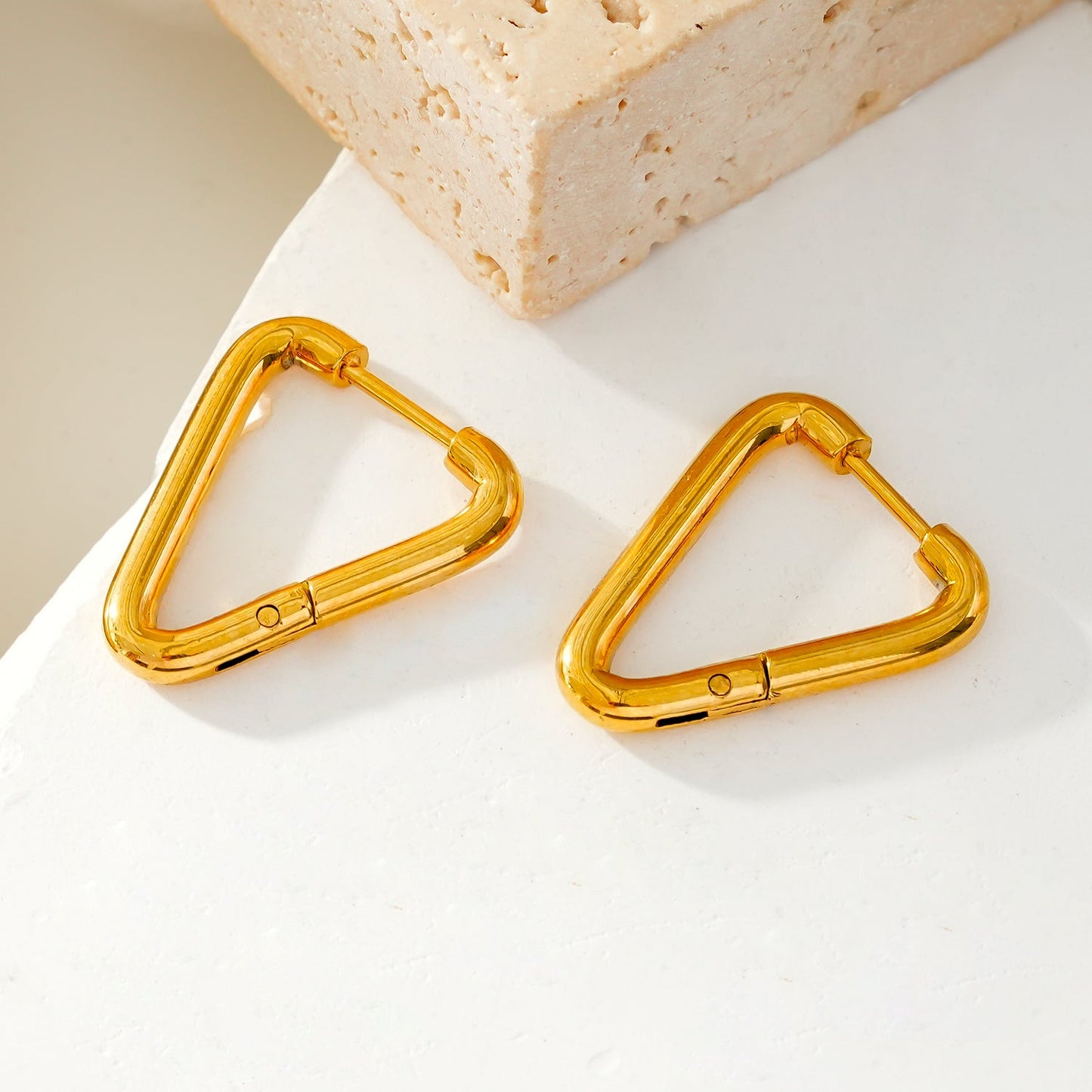 TRILO Gold: Modern Triangle Hoop Earrings - A Bold Twist on Classic Elegance